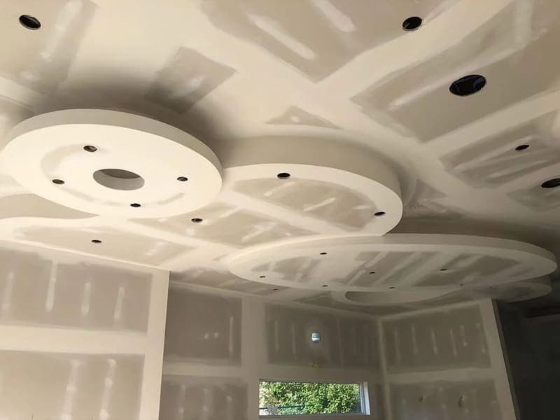 Drywall installation and taping in a residential renovation
